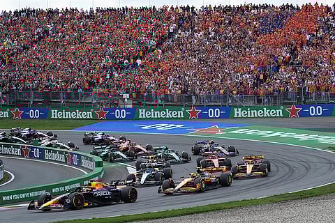 Dutch Grand Prix 2024: Red Bull driver Max Verstappen of the Netherlands, left, leads the field